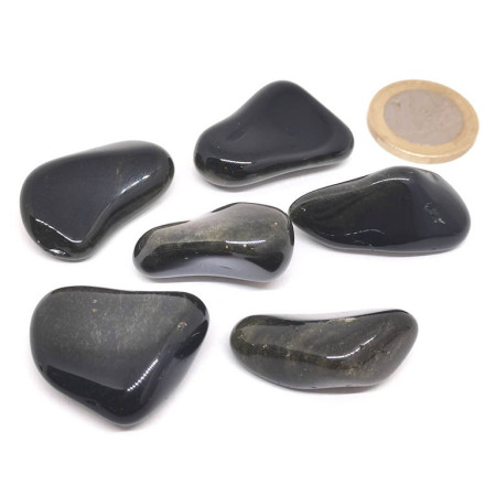 Photo de pierres roulées en obsidienne dorée