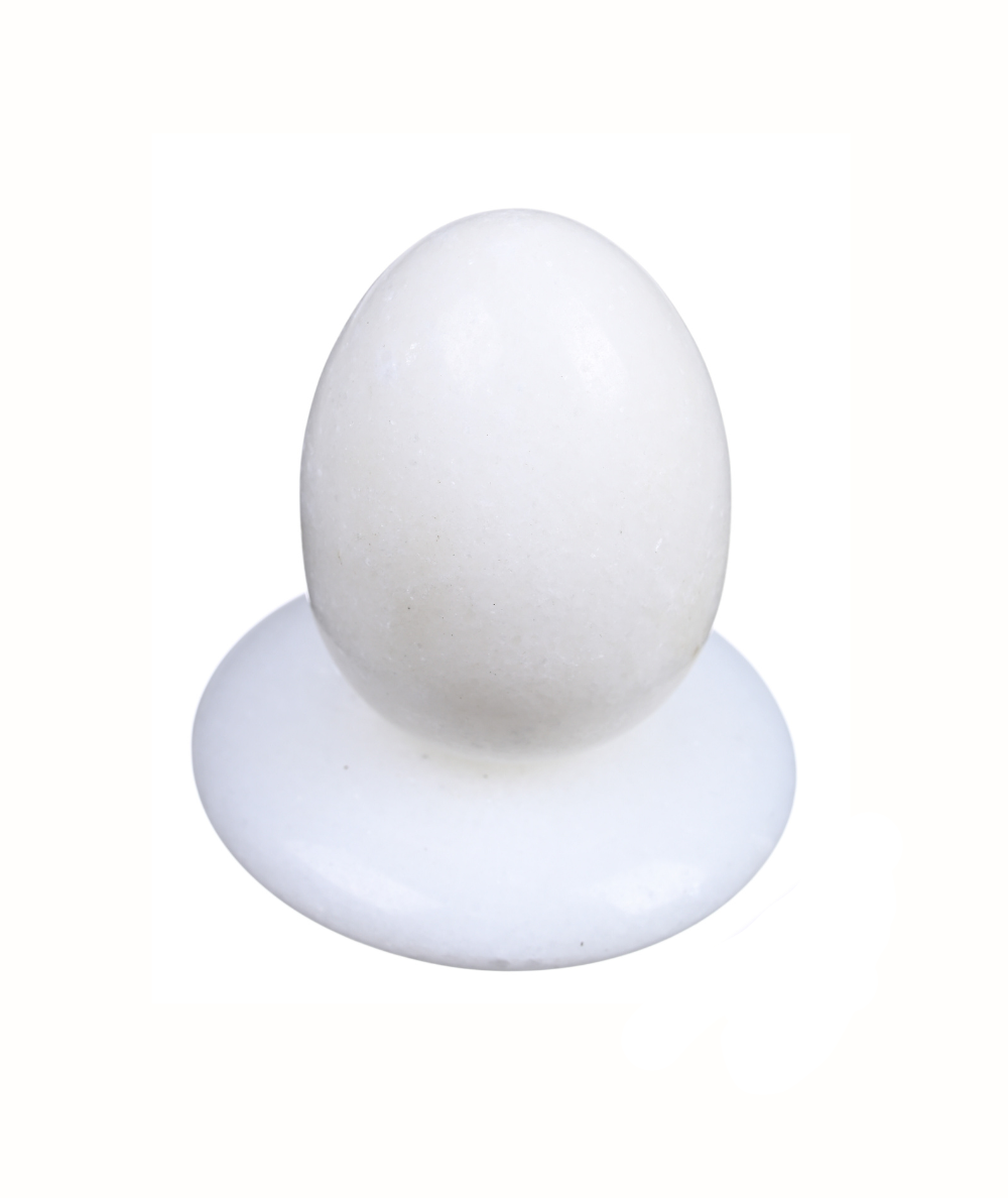 Photo oeuf et donut en jade blanc