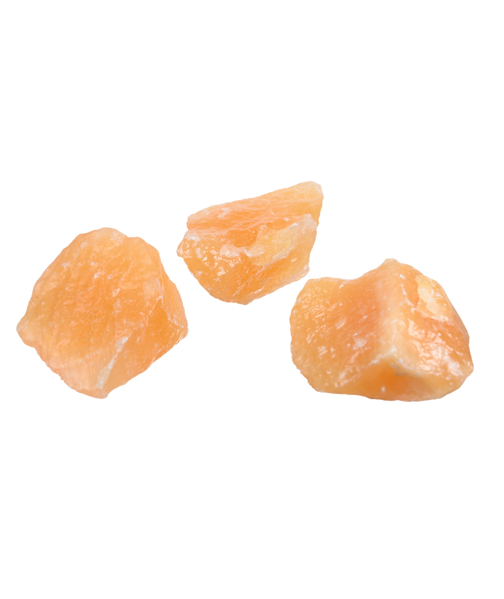 photo de pierres brutes en calcite orange